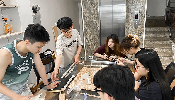 Students working on architectural models